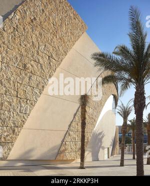 Exterior stone facade and walkway. 360 Mall, Kuweit City, Kuwait. Architect: CRTKL, 2021. Stock Photo