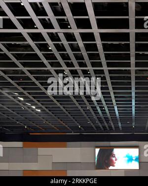 Projection screen and ceiling structure. 360 Mall, Kuweit City, Kuwait. Architect: CRTKL, 2021. Stock Photo