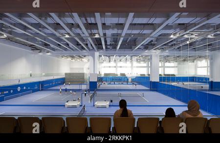 Interior tennis court. 360 Mall, Kuweit City, Kuwait. Architect: CRTKL, 2021. Stock Photo