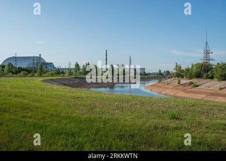 Nuclear Reactors of Chernobyl Nuclear Power Plant with Reactor 4 New Safe Confinement - Chernobyl Exclusion Zone, Ukraine Stock Photo