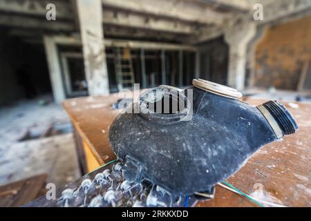 Broken Gas Mask at Duga Radar Control Center - Chernobyl Exclusion Zone, Ukraine Stock Photo