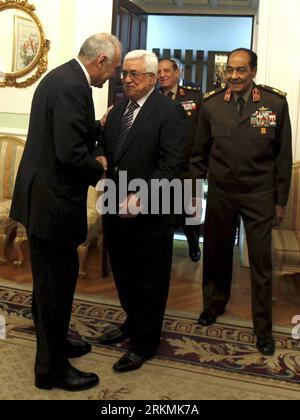 Bildnummer: 56776904  Datum: 22.12.2011  Copyright: imago/Xinhua (111222) -- CAIRO, Dec. 22, 2011 (Xinhua) -- Palestinian President Mahmoud Abbas (2nd L) shakes hands with Egypt s Foreign Minister Mohamed Kamel Amr as he arrives for a meeting with Field Marshal Mohamed Hussein Tantawi (R), the head of Egypt s ruling Supreme Council of the Armed Forces (SCAF), at the Defence Ministry in Cairo, Egypt, on Dec. 22, 2011. (Xinhua/POOL) (zw) EGYPT-PALESTINIAN-ABBAS-TANTAWI-MEETING PUBLICATIONxNOTxINxCHN People Politik premiumd xns x0x 2011 hoch      56776904 Date 22 12 2011 Copyright Imago XINHUA  C Stock Photo