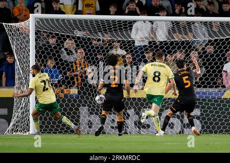 Bristol City's Nahki Wells (left) scores their sides first goal during the Sky Bet Championship match at the MKM Stadium, Hull. Picture date: Friday August 25, 2023. Stock Photo