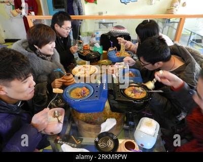 Bildnummer: 56802796  Datum: 02.01.2012  Copyright: imago/Xinhua (120103) -- BEIJING, Jan. 3, 2012 (Xinhua) -- take meals at a toilet-themed restaurant in Beijing, capital of China, on Jan. 2, 2012. The restaurant is decorated as a washroom, where closestool-shaped containers are used. (Xinhua) (wqc) CHINA-BEIJING-TOILET-THEMED RESTAURANT(CN) PUBLICATIONxNOTxINxCHN Gesellschaft Wirtschaft Gastronomie Restaurant Toilette Kurios Komik premiumd xbs x0x 2012 quer      56802796 Date 02 01 2012 Copyright Imago XINHUA  Beijing Jan 3 2012 XINHUA Take Meals AT a Toilet themed Restaurant in Beijing Capi Stock Photo