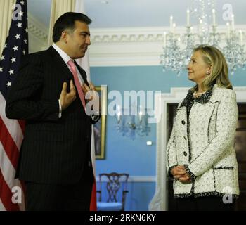 Bildnummer: 57001989  Datum: 01.02.2012  Copyright: imago/Xinhua (120202) -- WASHINGTON D.C., Feb. 2, 2012 (Xinhua) -- U.S. Secretary of State Hillary Clinton (R) looks at Georgian President Mikheil Saakashvili (L) while he speaks during a media conference after their meeting in Washington, D.C., on Feb. 1, 2012. President Saakashvili is on a state visit to Washington to mark the 20th anniversary of diplomatic relations between the United States and Georgia. (Xinhua/Fang Zhe)(wn) US-WASHINGTON-GEORGIA-DIPLOMACY PUBLICATIONxNOTxINxCHN People Politik USA premiumd xns x0x 2012 quadrat      570019 Stock Photo