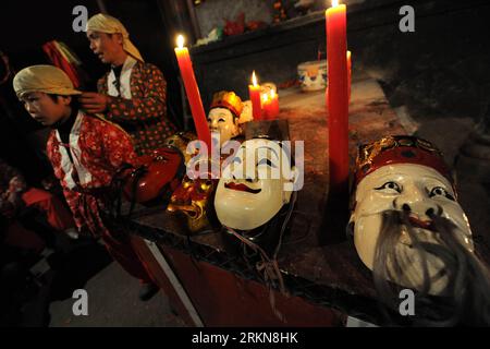 Bildnummer: 57032748  Datum: 08.02.2012  Copyright: imago/Xinhua (120208) -- NANFENG, Feb. 8, 2012 (Xinhua) -- Masks used for Nuo dance are seen prior to a performance at Miaoqian Village in Nanfeng County, east China s Jiangxi Province, Feb. 8, 2012. As a centuried tradition, villagers here usually perform the Nuo dance for 18 days from the beginning of Chinese Lunar New Year. It is a sacrificial ritual for locals to expel evil spirits and pray for blessings and harvests. (Xinhua/Zhou Ke)(bxy/hdt) CHINA-JIANGXI-TRADITIONAL NUO DANCE (CN) PUBLICATIONxNOTxINxCHN Gesellschaft Kultur Tanz Traditi Stock Photo