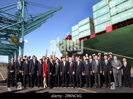 Bildnummer: 57080619  Datum: 16.02.2012  Copyright: imago/Xinhua (120216) -- LOS ANGELES, Feb. 16, 2012 (Xinhua) -- Chinese Vice President Xi Jinping (C, front) poses for photos with employees of China Shipping as he tours the company at the Port of Los Angeles in Los Angeles, California, the United States, on Feb. 16, 2012. (Xinhua/Lan Hongguang) (ly) U.S.-CHINA-XI JINPING-CHINA SHIPPING-TOUR (CN) PUBLICATIONxNOTxINxCHN People Politik USA xbs x0x 2012 quer premiumd      57080619 Date 16 02 2012 Copyright Imago XINHUA  Los Angeles Feb 16 2012 XINHUA Chinese Vice President Xi Jinping C Front Po Stock Photo