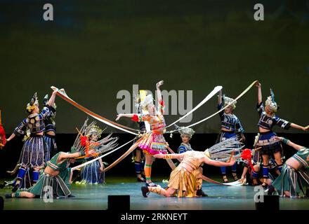 Bildnummer: 57107636  Datum: 25.02.2012  Copyright: imago/Xinhua (120225) -- MELBOURNE, Feb. 25, 2012 (Xinhua) -- Dancers from the folk song and dance company of southwest China s Guizhou province perform in Melbourne, Australia, Feb. 25, 2012. Nearly 2,000 audience watched the show. (Xinhua/Bai Xue) (dzl) AUSTRALIA-CHINESE-FOLK DANCE-PERFORMANCE PUBLICATIONxNOTxINxCHN Kultur Tanz Aktion x0x xsk 2012 quer      57107636 Date 25 02 2012 Copyright Imago XINHUA  Melbourne Feb 25 2012 XINHUA Dancers from The Folk Song and Dance Company of Southwest China S Guizhou Province perform in Melbourne Aust Stock Photo