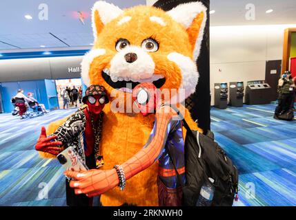 Toronto, Canada. 25th Aug, 2023. Cosplayers pose for a selfie during the 2023 Fan Expo Canada in Toronto, Canada, on Aug. 25, 2023. As one of the largest comics, sci-fi, anime and gaming events in Canada, the annual event is held here from Aug. 24 to Aug. 27, attracting hundreds of thousands of fans from across the world. Credit: Zou Zheng/Xinhua/Alamy Live News Stock Photo