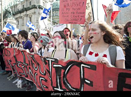 Bildnummer: 57607339  Datum: 22.03.2012  Copyright: imago/Xinhua (120323) -- MONTREAL, March 23, 2012 (Xinhua) -- Tens of thousands of university students attend a demonstration protesting against the provincial government s plan to raise university tuition fees by 325 Canadian dollars a year for each of the next five years, in downtown Montreal, Canada, March 22, 2012. (Xinhua/Andrew Soong) (ybg) CANADA-MONTREAL-DEMONSTRATION-TUITION FEES PUBLICATIONxNOTxINxCHN Gesellschaft Bildung Studenten Universität Demo Protest gegen Studiengebühren Studentenprotest xbs x0x 2012 quer premiumd      576073 Stock Photo