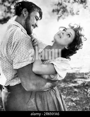 Richard Egan, Susan Hayward, on-set of the Film, 'Untamed', 20th Century-Fox, 1955 Stock Photo