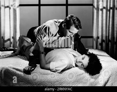 Paul Newman, Jean Simmons, on-set of the Film, 'Until They Sail', MGM, 1957 Stock Photo