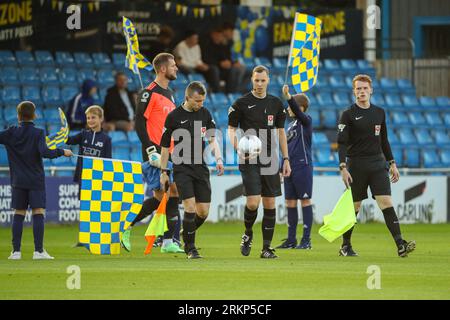 Armco Arena, Solihull, UK, 25th Aug 2023, referees enter pitch during Vanarama National League match between Solihull Moors FC and FC Halifax Town held at Solihull Moors Armco Arena Credit: Nick Phipps/Alamy Live News Stock Photo