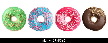 Set mit leckeren Donuts isoliert auf weiß Stockfoto