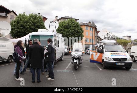 Bildnummer: 57959625  Datum: 05.05.2012  Copyright: imago/Xinhua (120505) -- TULLE, May 5, 2012 (Xinhua) -- Broadcast vans are seen at the cathedral square in Tulle, southern France, May 5, 2012. The 2nd round of the 2012 French presidential election will be held on May 6 when France s Socialist Party s candidate Francois Hollande will compete with France s incumbent President, UMP party s candidate Nicolas Sarkozy. (Xinhua/Gao Jing) FRANCE-TULLE-PRESIDENTIAL ELECTION-2ND ROUND PUBLICATIONxNOTxINxCHN Politik Wahl Präsidentschaftswahl Stichwahl Berichterstattung xjh x0x premiumd 2012 quer Stock Photo