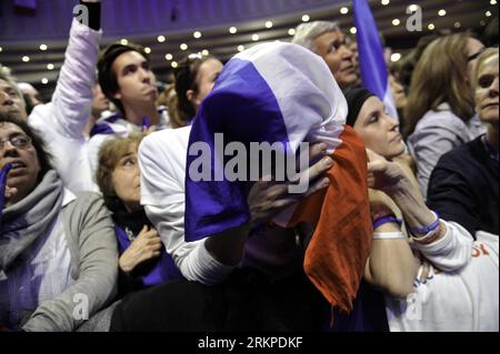 Bildnummer: 57962387  Datum: 06.05.2012  Copyright: imago/Xinhua (120506) -- PARIS, May 6, 2012 (Xinhua) -- A supporter of Nicolas Sarkozy is crying as they hear the poll results at a rally in Paris after the 2nd round of the 2012 French presidential election in Paris, France, May 6, 2012. French Socialist Party leader Francois Hollande defeated incumbent French President Nicolas Sarkozy in Sunday s decisive presidential runoff as most previous opinion polls had predicted. (Xinhua/Etienne Laurent) FRANCE-PARIS-PRESIDENTIAL ELECTION-RESULT PUBLICATIONxNOTxINxCHN Politik Wahl Präsidentschaftswah Stock Photo