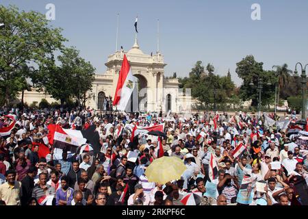 Bildnummer: 57981263  Datum: 11.05.2012  Copyright: imago/Xinhua (120511) -- CAIRO, May 11, 2012 (Xinhua) -- Protestors hold banners and Egyptian flags during a demonstration in support of the military in Cairo s Hadayek al-Quba district on May 11, 2012. (Xinhua/Nasser Nouri) EGYPT-CAIRO-ANTI-SCAF-RALLY PUBLICATIONxNOTxINxCHN Politik Demo Protest xda x0x 2012 quer      57981263 Date 11 05 2012 Copyright Imago XINHUA  Cairo May 11 2012 XINHUA protestors Hold Banners and Egyptian Flags during a Demonstration in Support of The Military in Cairo S  Al Quba District ON May 11 2012 XINHUA Nasser Nou Stock Photo