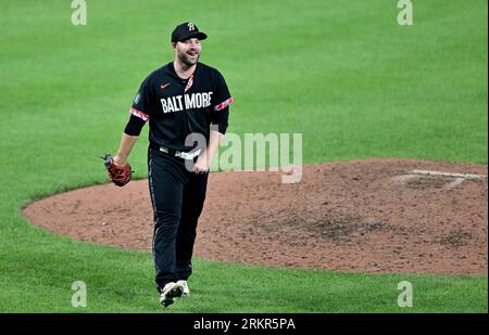 Baltimore, United States. 25th Aug, 2023. Baltimore Orioles relief pitcher Danny Coulombe smiles after delivering one pitch to seal a 5-4 win against the Colorado Rockies during the ninth inning of interleague play at Camden Yards in Baltimore, MD, on Friday, August 25, 2023. Baltimore won 5-4. Photo by David Tulis/UPI Credit: UPI/Alamy Live News Stock Photo