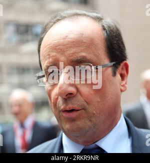 Bildnummer: 58160113  Datum: 28.06.2012  Copyright: imago/Xinhua (120628) -- BRUSSELS, June 28, 2012 (Xinhua) -- French President Francois Hollande arrives for the EU summit at EU s headquarters in Brussels, capital of Belgium, on June 28, 2012. European leaders are expected to focus on boosting growth and building a stronger Economic and Monetary Union (EMU) during the summit on Thursday and Friday. (Xinhua/Yan Ting) (ypf) BELGIUM-EU-SUMMIT PUBLICATIONxNOTxINxCHN People Politik Gipfel Gipfeltreffen Porträt xns x0x 2012 quadrat premiumd      58160113 Date 28 06 2012 Copyright Imago XINHUA  Bru Stock Photo