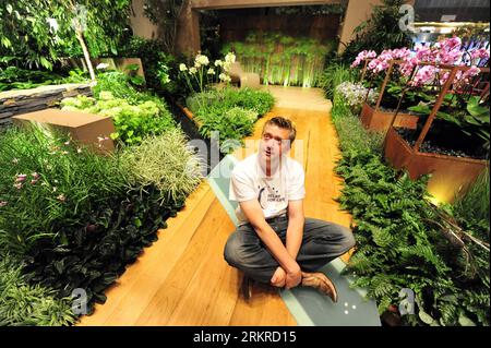 Bildnummer: 58200951  Datum: 06.07.2012  Copyright: imago/Xinhua (120706) -- SINGAPORE, July 6, 2012 (Xinhua) -- Ireland s designer Paul Martin poses for photos in his gold award-winning garden for Landscape Gardens category, The Path of Life , during a media preview of the Singapore Garden Festival in Singapore, July 6, 2012. The 4th Singapore Garden Festival will open to the public at Suntec Singapore International Convention & Exhibition Centre on Saturday. (Xinhua/Then Chih Wey) SINGAPORE-GARDEN FESTIVAL-PREVIEW PUBLICATIONxNOTxINxCHN Gesellschaft Gartenausstellung Ausstellung Garten Garte Stock Photo