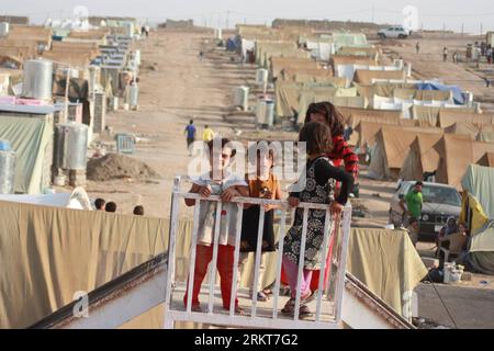 Bildnummer: 58397837  Datum: 28.08.2012  Copyright: imago/Xinhua (120828) -- FAIDA(IRAQ), Aug. 28, 2012 (Xinhua) -- Children play at a Syrian refugees camp in Faida in northern Kurdish Dohuk province, Iraq, on Aug. 28, 2012. More than 10,000 Syrian refugees have fled to Iraq s northern semi-autonomous region of Kurdistan since Syria crisis worsened, Iraqi local officials said on Tuesday. The central government in Baghdad and Kurdistan government have set up several refugee camps in the border areas which can accomodate thousands. (Xinhua) (zw) IRAQ-SYRIA-REFUGEES PUBLICATIONxNOTxINxCHN Gesells Stock Photo