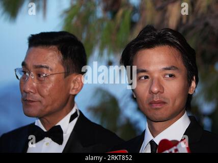 Bildnummer: 58403068  Datum: 29.08.2012  Copyright: imago/Xinhua (120829) -- VENICE, Aug. 29, 2012 (Xinhua) -- Cast members of Chinese film Tai Chi 0 , Chinese Hong Kong actor Tony Leung Ka-fai (L) and director Stephen Fung Tak-lun receive an interview during the 69th Venice International Film Festival, in Venice, Italy, Aug. 29, 2012. (Xinhua/Gao Jing) ITALY-VENICE-FILM FESTIVAL-TAI CHI 0 PUBLICATIONxNOTxINxCHN Kultur Entertainment People Film 69. Internationale Filmfestspiele Venedig xns x0x 2012 quer      58403068 Date 29 08 2012 Copyright Imago XINHUA  Venice Aug 29 2012 XINHUA Cast Member Stock Photo