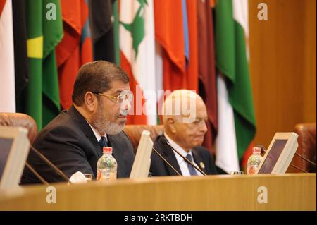 Bildnummer: 58435271  Datum: 05.09.2012  Copyright: imago/Xinhua (120905) -- CAIRO, Sept. 5, 2012 (Xinhua) -- Egypt s president Mohamed Morsi (L) attends the opening session of the Arab League s (AL) 138th regular meeting of foreign ministers at the AL headquarters in Cairo, Egypt, Sept. 5, 2012. The Arab countries were responsible for the bloodshed in Syria, Egyptian President Mohamed Morsi said Wednesday, calling on those countries to act quickly. (Xinhua/Egyptian Presidency) EGYPT-CAIRO-AL-SYRIA PUBLICATIONxNOTxINxCHN people Politik x0x xdd 2012 quer      58435271 Date 05 09 2012 Copyright Stock Photo