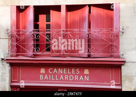 Bordeaux, Frankreich - 08 19 2023 : Baillardran Caneles Markenlogo und Textschild Wandfassade Lokale französische burgunderrote Konditorfassade in Bordeaux fr Stockfoto