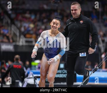 August 25, 2023: Leanne Wong, with her coach Owen Field in the background, following her uneven bar routine at the Woman's Day 1 of the 2023 U.S. Gymnastics Championships at SAP Arena in San Jose, CA. Kyle Okita/CSM Credit: Cal Sport Media/Alamy Live News Stock Photo