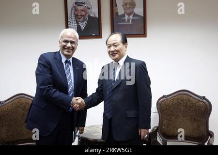 121022 -- RAMALLAH, Oct. 22, 2012 Xinhua -- Chinese Special Envoy to the Middle East Wu Sike R shakes hands with chief Palestinian negotiator Saeb Erekat during their meeting in the West Bank city of Ramallah on Oct. 22, 2012. Xinhua/Fadi Arouri nxl MIDEAST-WEST BANK-RAMALLAH-CHINA-WU SIKE-SAEB EREKAT-MEETING PUBLICATIONxNOTxINxCHN Stock Photo