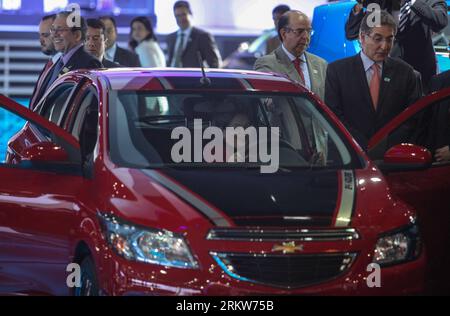 Bildnummer: 58626983  Datum: 24.10.2012  Copyright: imago/Xinhua (121024) -- SAO PAULO, Oct. 24, 2012 (Xinhua) -- Brazil s President Dilma Rousseff (C) drives a car during the 27th International Automobile Trade Show in Sao Paulo, Brazil, Oct. 24, 2012. The Automobile Trade Show, which showcases more than 500 cars, runs from October 24 to November 4. (Xinhua/Agencia Estado) BRAZIL OUT BRAZIL-SAO PAULO-INDUSTRY-AUTO SHOW-ROUSSEFF PUBLICATIONxNOTxINxCHN People Politik xjh x0x premiumd 2012 quer      58626983 Date 24 10 2012 Copyright Imago XINHUA  Sao Paulo OCT 24 2012 XINHUA Brazil S President Stock Photo