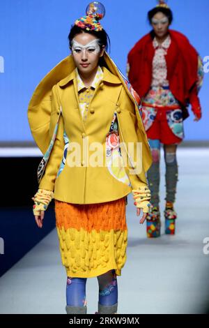 Bildnummer: 58644805  Datum: 29.10.2012  Copyright: imago/Xinhua (121029) -- BEIJING, Oct. 29, 2012 (Xinhua) -- Models present creations at a fashion show during the 2012 China Fashion Week in Beijing, capital of China, Oct. 29, 2012. The creations on the show were designed by graduates of the ESMOD Beijing International Fashion Institutes & Universities Group. (Xinhua/Li Mingfang) (mp) CHINA-BEIJING-FASHION SHOW-ESMOD GRADUATE COLLECTION (CN) PUBLICATIONxNOTxINxCHN Kultur Entertainment Modewoche Mode Modenschau x0x xdd 2012 hoch      58644805 Date 29 10 2012 Copyright Imago XINHUA  Beijing OC Stock Photo