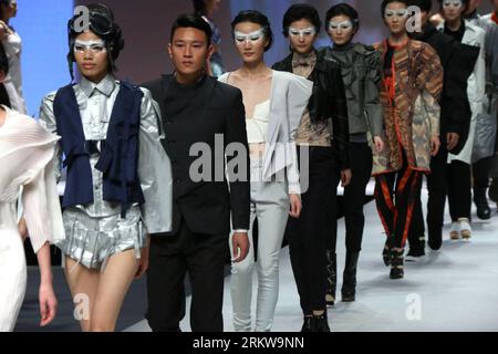 Bildnummer: 58644808  Datum: 29.10.2012  Copyright: imago/Xinhua (121029) -- BEIJING, Oct. 29, 2012 (Xinhua) -- Models present creations at a fashion show during the 2012 China Fashion Week in Beijing, capital of China, Oct. 29, 2012. The creations on the show were designed by graduates of the ESMOD Beijing International Fashion Institutes & Universities Group. (Xinhua/Li Mingfang) (mp) CHINA-BEIJING-FASHION SHOW-ESMOD GRADUATE COLLECTION (CN) PUBLICATIONxNOTxINxCHN Kultur Entertainment Modewoche Mode Modenschau x0x xdd 2012 quer      58644808 Date 29 10 2012 Copyright Imago XINHUA  Beijing OC Stock Photo