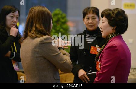 Bildnummer: 58671794  Datum: 06.11.2012  Copyright: imago/Xinhua (121106) -- BEIJING, Nov. 6, 2012 (Xinhua) -- Liu Lige (1st R) and Yang Ruihui (2nd R), who are delegates of the 18th National Congress of the Communist Party of China (CPC), are interviewed by journalists at a hotel in Beijing, capital of China, Nov. 6, 2012. As delegates of the 18th CPC National Congress have arrived in Beijing, journalists are busy in interviewing the delegates prior to the opening of the congress. (Xinhua/Wang Jianhua) (hdt) (CPC CONGRESS) CHINA-BEIJING-18TH CPC NATIONAL CONGRESS-DELEGATES-JOURNALISTS (CN) PU Stock Photo