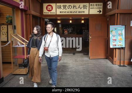 San Francisco, California, USA. 7th Aug, 2023. A couple walks at the Japantown. (Credit Image: © Michael Ho Wai Lee/SOPA Images via ZUMA Press Wire) EDITORIAL USAGE ONLY! Not for Commercial USAGE! Stock Photo