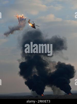 Bildnummer: 58953617  Datum: 27.12.2012  Copyright: imago/Xinhua (121227) -- BEERSHEVA(ISRAEL), Dec. 27, 2012 (Xinhua) -- A Boeing AH-64 Apache longbow attack helicopter of Israeli Air Force (IAF) launches anti-missile flares during an air show at a graduation ceremony of Israeli military pilots at IAF s Hatzerim base near Beersheva, south Israel, on Dec. 27, 2012. (Xinhua/Yin Dongxun) ISRAEL-BEERSHEVA-GRADUATION CEREMONY PUBLICATIONxNOTxINxCHN Politik Militär Armee Luftwaffe Soldaten Entlassung Abschluss Flugzeug premiumd xmk x0x 2012 hoch      58953617 Date 27 12 2012 Copyright Imago XINHUA Stock Photo