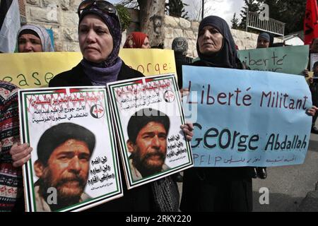 Bildnummer: 59122600  Datum: 23.01.2013  Copyright: imago/Xinhua (130123) -- NABLUS, Jan. 23, 2013 (Xinhua) -- Palestinian supporters of Lebanese pro-Palestinian militant Georges Ibrahim Abdallah hold pictures of him as they take part in a protest calling for the release of Abdallah from jail in France, in the West Bank city of Nablus, on Jan. 23, 2013. (Xinhua/Nidal Eshtayeh)(zf) MIDEAST-NABLUS-PROTEST-IBRAHIM ABDALLAH PUBLICATIONxNOTxINxCHN Politik Demo Protest xjh x0x 2013 quer premiumd      59122600 Date 23 01 2013 Copyright Imago XINHUA  Nablus Jan 23 2013 XINHUA PALESTINIAN Supporters of Stock Photo