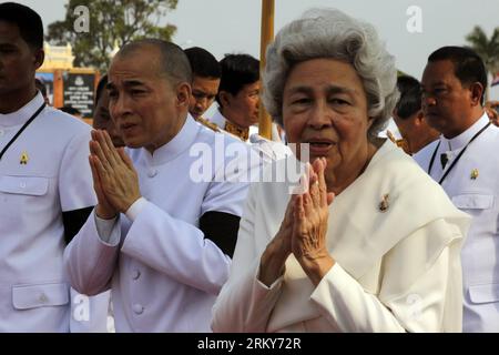 Cambodian King Norodom Sihamoni is carried to the Royal Palace Friday ...