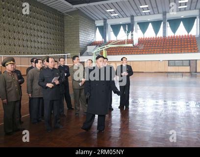 Bildnummer: 59325728  Datum: 08.03.2013  Copyright: imago/Xinhua top leader of the Democratic People s Republic of Korea (DPRK) Kim Jong Un (front) inspecting the sports village in Chongchun Street March 8, 2013. The village was built on the occasion of the 40th anniversary of the founding of the DPRK. It is a comprehensive sports and cultural centre with gymnasiums, sports persons restaurant, hotels and welfare service facilities. (Xinhua/KCNA) (msq) DPRK-KIM JONG UN-SPORTS VILLAGE-INSPECTION PUBLICATIONxNOTxINxCHN Politik People Nord Korea Nordkorea x0x xub 2013 quer Highlight premiumd     5 Stock Photo