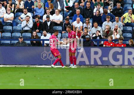 Deepdale Stadium, Preston, England - 26th August 2023 Harrison Ashby (30) of Swansea City celebrates with Liam Cullen (20) after scoring the 1st goal - during the game Preston NE v Swansea City, EFL Championship, 2023/24, Deepdale Stadium, Preston, England - 26th August 2023  Credit: Arthur Haigh/WhiteRosePhotos/Alamy Live News Stock Photo