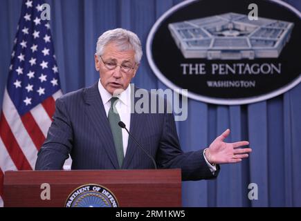 Bildnummer: 59596996  Datum: 02.05.2013  Copyright: imago/Xinhua (130502) -- WASHINGTON D.C., May 2, 2013 (Xinhua) -- U.S. Defense Secretary Chuck Hagel speaks during a press conference following the bilateral meeting with visiting British Defense Secretary Philip Hammond at Pentagon in Washington D.C., capital of the United States, on May 2, 2013. (Xinhua/Fang Zhe) US-WASHINGTON-UK-DEFENCE PUBLICATIONxNOTxINxCHN People Politik xsp x0x 2013 quer      59596996 Date 02 05 2013 Copyright Imago XINHUA  Washington D C May 2 2013 XINHUA U S Defense Secretary Chuck Hagel Speaks during a Press Confere Stock Photo