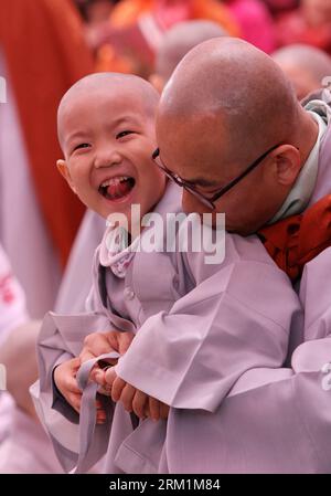 Bildnummer: 59598408  Datum: 03.05.2013  Copyright: imago/Xinhua (130503) -- SEOUL, May 3, 2013 (Xinhua) -- A South Korean child monk attends a ritual to celebrate Buddha s upcoming birthday on May 28 at the Chogye temple in Seoul, South Korea, May 3, 2013. Ten children entered the temple to have an experience of monks life for two weeks. (Xinhua/Park Jin-hee) SOUTH KOREA-SEOUL-BOY MONK PUBLICATIONxNOTxINxCHN xcb x0x 2013 hoch      59598408 Date 03 05 2013 Copyright Imago XINHUA  Seoul May 3 2013 XINHUA a South Korean Child Monk Attends a Ritual to Celebrate Buddha S upcoming Birthday ON May 2 Stock Photo