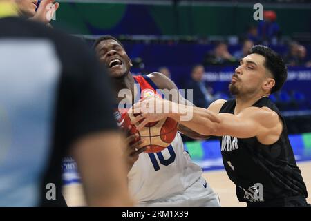 Pasay City, Metro Manila, Philippines. 26th Aug, 2023. Anthony Edwards (10, White) is fouled by Shea Ili (5, Black).Team USA scoring a 99-72 victory over New Zealand. New Zealand tried to keep up but failed to match the firepower of the young USA squad. USA was bannered by reigning NBA Rookie of the Year Paolo Banchero who scored 21 Points and grabbed 4 Rebounds for his team. New Zealand, on the other hand was backstopped by Reuben Te Rangi who scored 15 points in a losing effort. (Credit Image: © Dennis Jerome Acosta/Pacific Press via ZUMA Press Wire) EDITORIAL USAGE ONLY! Not for Commercia Stock Photo