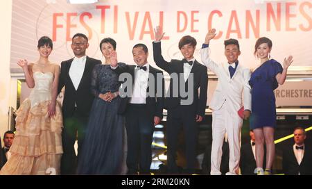 Bildnummer: 59661060  Datum: 17.05.2013  Copyright: imago/Xinhua (130518) -- CANNES, May, 2012 (Xinhua) -- Chinese actress Li Meng(1st, L), actor Jiang Wu (2nd, L), actress Zhao Tao (3rd, L), director Jia Zhangke (C),actor Luo Lanshan (3rd, R) and Wang Baoqiang (2nd, R) attend the screening for Chinese film Tian Zhu Ding (A Touch of Sin) by Jia Zhangke at the 66th Cannes Film Festival in Cannes, southern France, May 17, 2013. (Xinhua/Gao Jing) FRANCE-CANNES-FILM FESTIVAL-TIAN ZHU DING(A TOUCH OF SIN)-PREMIERE PUBLICATIONxNOTxINxCHN People Kultur Entertainment Film 66 Internationale Filmfestspi Stock Photo