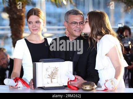 Bildnummer: 59707663  Datum: 26.05.2013  Copyright: imago/Xinhua (130526) -- CANNES, May 26, 2012 (Xinhua) -- Cast members of La Vie D Adele (L to R) French actress Lea Seydoux, director Abdellatif Kechiche and actress Adele Exarchopoulos pose during a photocall after being awarded with Palme d Or for the film La Vie d Adele at the 66th Cannes Film Festival in Cannes, France, on May 26, 2013. The festival ended here on Sunday night. (Xinhua/Gao Jing) FRANCE-CANNES-FILM FESTIVAL-LA VIE D ADELE-PALME D OR PUBLICATIONxNOTxINxCHN Kultur Entertainment People Film 66 Internationale Filmfestspiele Ca Stock Photo