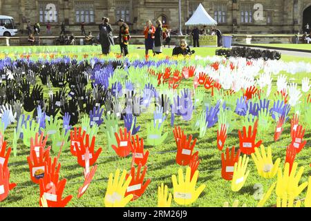 Bildnummer: 59713077  Datum: 27.05.2013  Copyright: imago/Xinhua (130527) -- SYDNEY, May 27, 2013 (Xinhua) -- Photo taken on May 27, 2013, shows the large art work of The Sea of Hands during the Reconciliation Week 2013 in the University of Sydney, Australia. The first Sea of Hands was held on Oct. 12, 1997, in Australia s capital of Canberra. (Xinhua/Jin Linpeng) AUSTRALIA-SYDNEY-SEA OF HANDS-RECONCILIATION-ART PUBLICATIONxNOTxINxCHN Gesellschaft Kunst Kultur Installationskunst Installation Hand x0x xdd 2013 quer premiumd      59713077 Date 27 05 2013 Copyright Imago XINHUA  Sydney May 27 201 Stock Photo