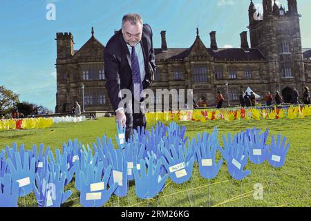 Bildnummer: 59713075  Datum: 27.05.2013  Copyright: imago/Xinhua (130527) -- SYDNEY, May 27, 2013 (Xinhua) -- A man plants a plastic hand in the large art work of The Sea of Hands during the Reconciliation Week 2013 in the University of Sydney, Australia, on May 27, 2013. The first Sea of Hands was held on Oct. 12, 1997, in Australia s capital Canberra. (Xinhua/Jin Linpeng) AUSTRALIA-SYDNEY-SEA OF HANDS-RECONCILIATION-ART PUBLICATIONxNOTxINxCHN Gesellschaft Kunst Kultur Installationskunst Installation Hand x0x xdd 2013 quer premiumd      59713075 Date 27 05 2013 Copyright Imago XINHUA  Sydney Stock Photo