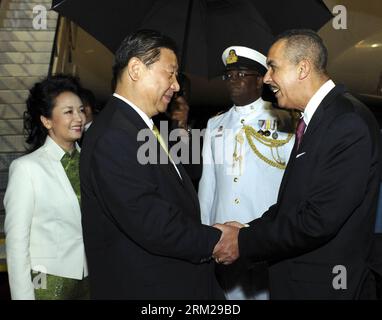 Bildnummer: 59744657  Datum: 31.05.2013  Copyright: imago/Xinhua (130531) -- PORT OF SPAIN, May 31, 2013 (Xinhua) -- Chinese President Xi Jinping (2nd L) and his wife Peng Liyuan (1st L) arrive in Port of Spain May 31, 2013 to start a state visit to Trinidad and Tobago. Xi Jinping and Peng Liyuan were welcomed by President Anthony Carmona and Prime Minister Kamla Persad-Bissessar of Trinidad and Tobago at the airport. (Xinhua/Rao Aimin) (wqq) TRINIDAD AND TOBAGO-PORT OF SPAIN-CHINESE PRESIDENT-ARRIVAL PUBLICATIONxNOTxINxCHN People Politik xdp x1x 2013 quer premiumd  o0 Familie privat Frau Stock Photo