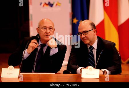 Bildnummer: 59836450  Datum: 14.06.2013  Copyright: imago/Xinhua ROME, June 14, 2013 - French Labour, Employment and Social Dialogue Minister Michel Sapin (L) and French Finance Minister Pierre Moscovici attend the press conference in Rome, Italy, June 14, 2013. A rapid improvement in the labor market to return Europe s stumbling economy to growth was at the center of a summit on jobs held in Rome on Friday by economic and labor ministers from Italy, France, Germany and Spain. (xinhua/Xu Nizhi) ROME-SUMMIT PUBLICATIONxNOTxINxCHN People Politik Gipfel gegen Jugendarbeitslosigkeit x0x xkg 2013 q Stock Photo