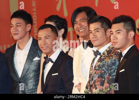 Bildnummer: 59838465  Datum: 15.06.2013  Copyright: imago/Xinhua (130615) -- SHANGHAI, June 15, 2013 (Xinhua) -- Movie stars (4th R) Donnie Yen, Chow Yun-fat (3rd R) and Aaron Kwok (2nd R) pose on the red carpet for the opening ceremony of the 16th Shanghai International Film Festival in Shanghai, east China, June 15, 2013. (Xinhua/Pei Xin) (hdt) CHINA-SHANGHAI-FILM FESTIVAL-OPEN (CN) PUBLICATIONxNOTxINxCHN Entertainment People Film Filmfestival xcb x0x 2013 quer premiumd      59838465 Date 15 06 2013 Copyright Imago XINHUA  Shanghai June 15 2013 XINHUA Movie Stars 4th r Donnie Yen Chow Yun Fa Stock Photo